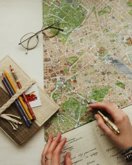 eyeglasses on map by oxana v courtesy of Unsplash.