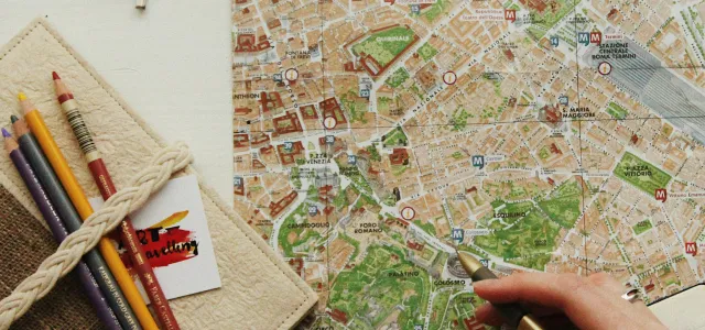 eyeglasses on map by oxana v courtesy of Unsplash.